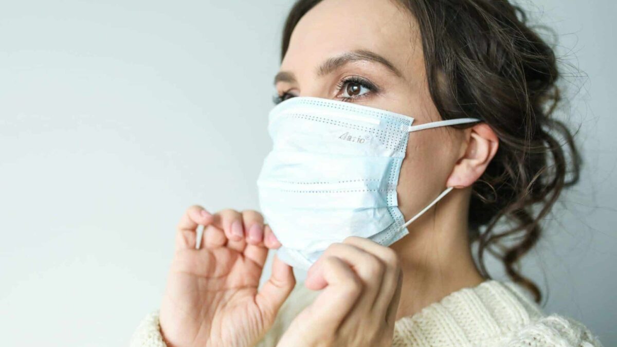 a woman wearing medical face mask